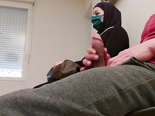 Jerking off a stranger's penis does not bother a Muslim madam